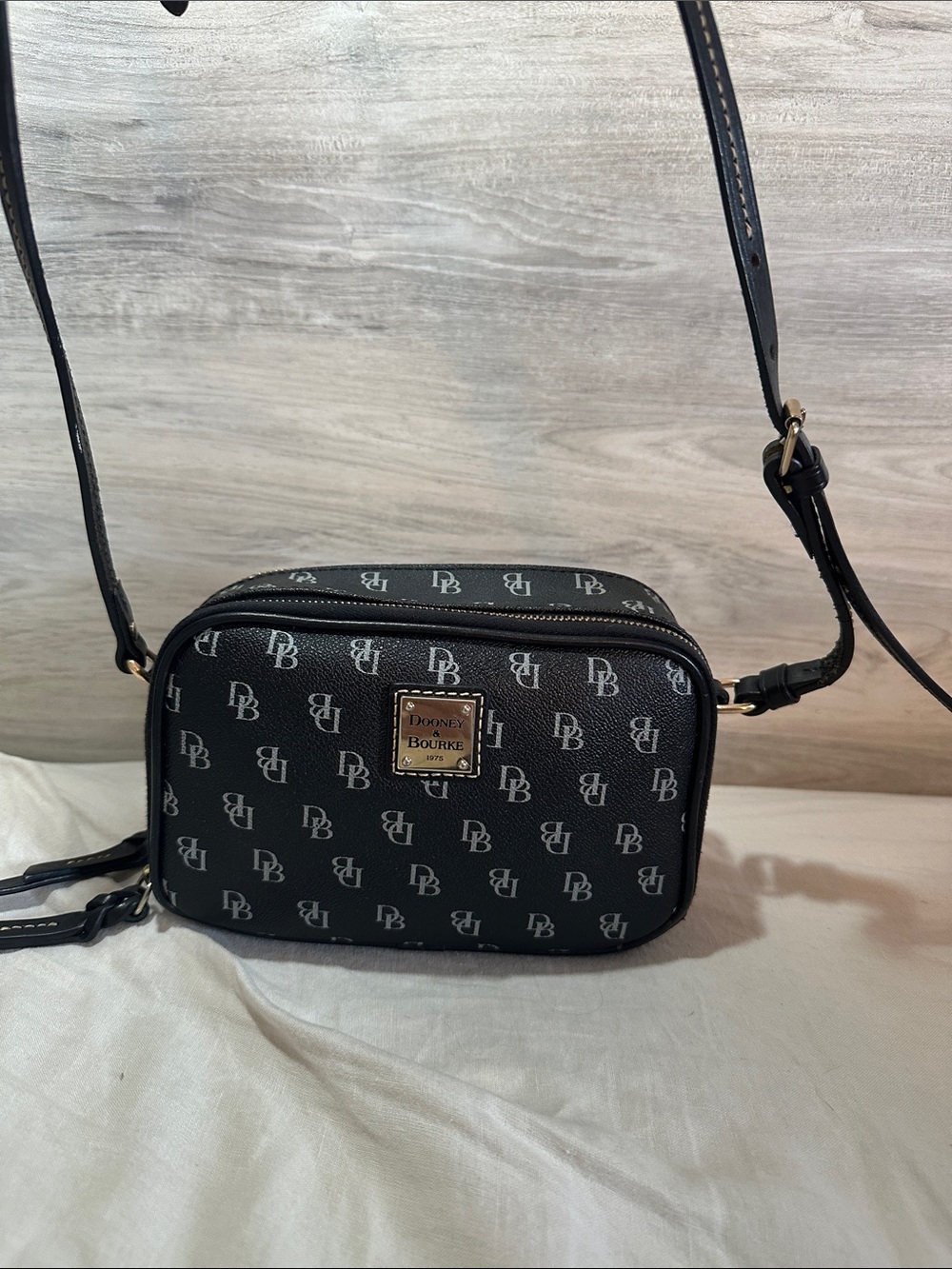 Dooney & Bourke Black Monogram Crossbody with Gold Plaque